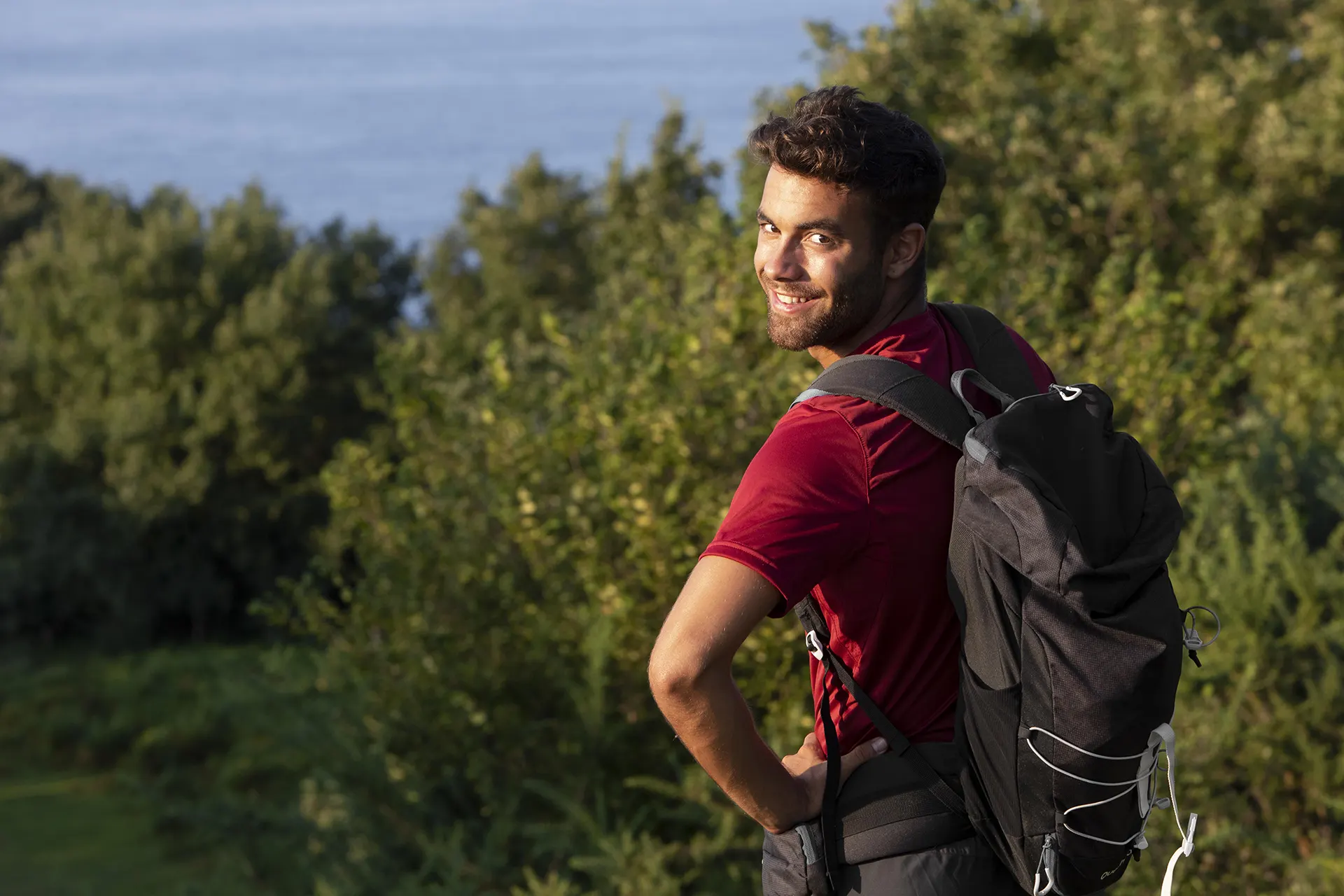 young male traveler going hike